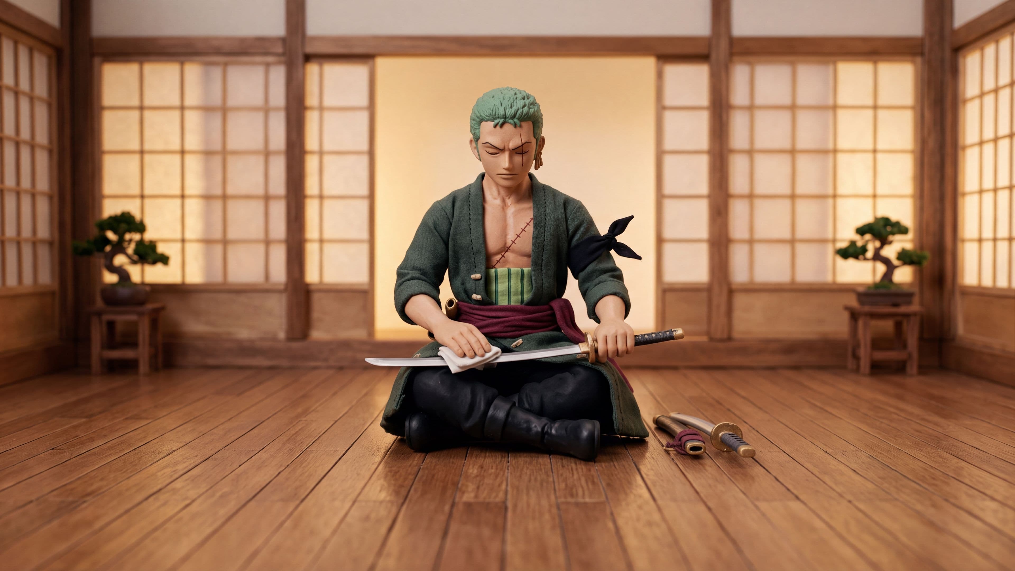 Roronoa Zoro desktop wallpaper: A clay Zoro kneeling in a tiny dojo, polishing a sword blade with a white cloth