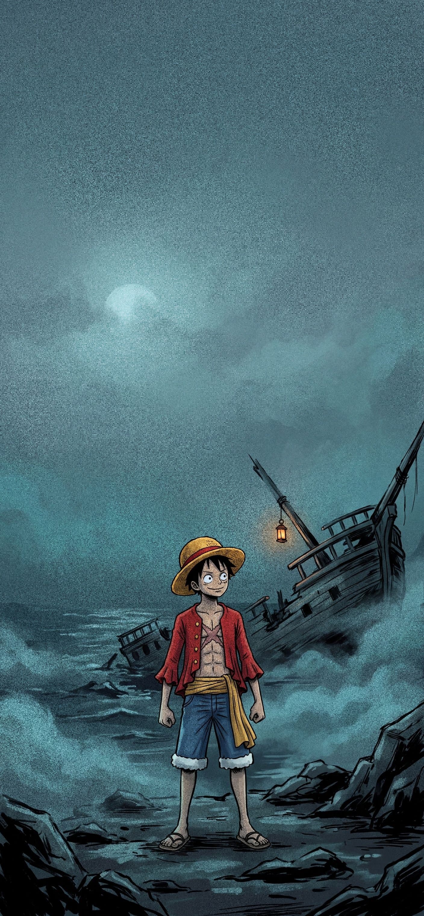 Monkey D. Luffy wallpaper: Luffy standing on a rocky shore at night beside an old shipwreck with one lantern, teal fog rolling in